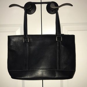 Black leather Latico handbag.